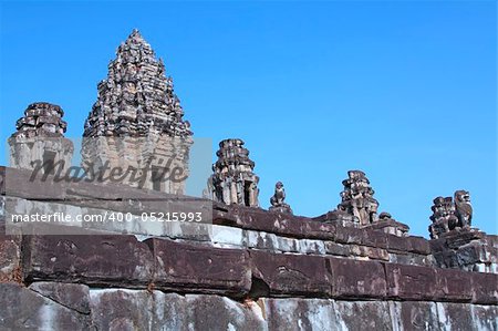 Temple with towers in Angkor. Ancient Khmer city in Cambodia. UNESCO world heritage site