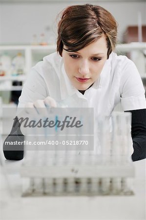 science chemistry classes with young student woman in labaratory