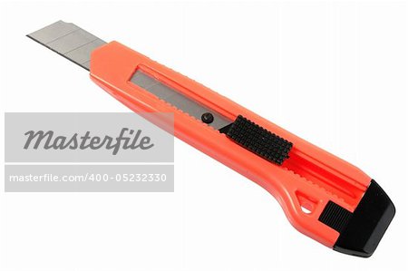 Orange paper knife. Close-up. Isolated on white. Studio photography.