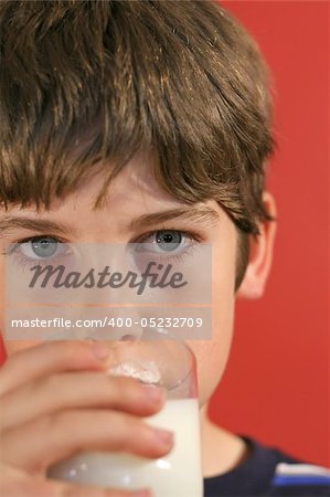 boy drinking milk vertical upclose