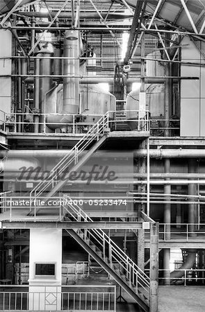 Building interior structure of old factory in black and white.