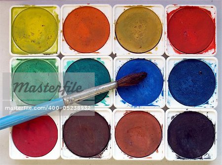 Painting tools with colour palette and brushes