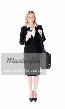 Smiling blond businesswoman holding coffee and a briefcase against white background