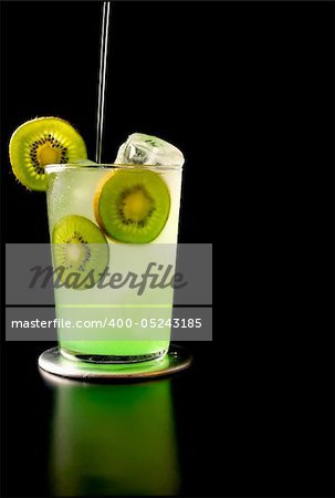 Cool kiwi, a designer cocktail being poured