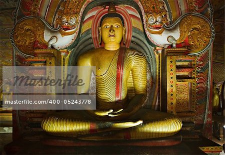 Ancient Buddha image in Dambulla Rock Temple caves, Sri Lanka