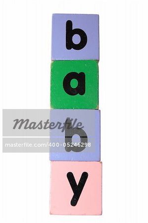 assorted childrens toy letter building blocks against a white background that spell baby with clipping path