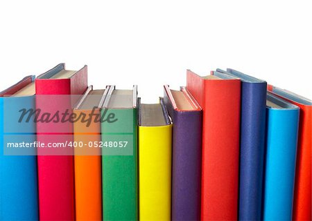 close up of stack of colorful books on white background, with clipping path included