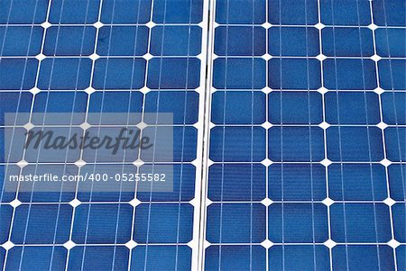 Solar Panel with background blue sky and white clouds