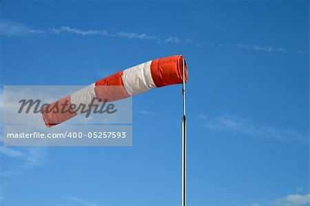 Wind sock in front of blue sky