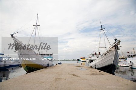Makassar schooners (pinisi) in Paotere harbor, the old port of Makassar,  Indonesia