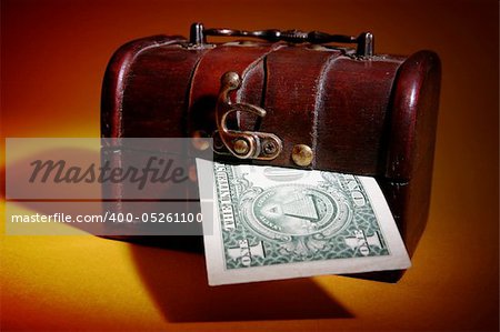 Wood cashbox isolated on brown