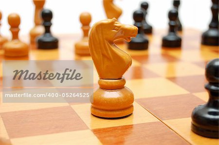 Knight chessman on chess board