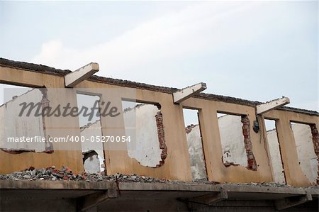 Shell of an old building under demolition