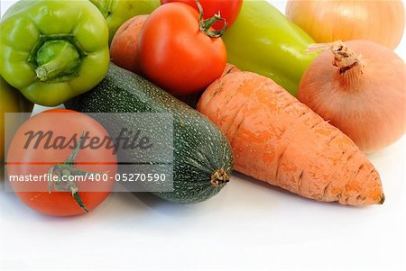 Groop of fresh vegetables on white. Closeup