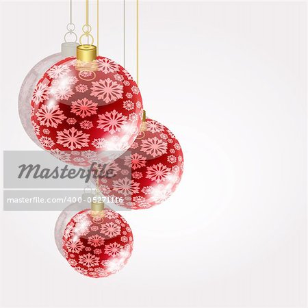 Christmas balls on golden strings on a light background