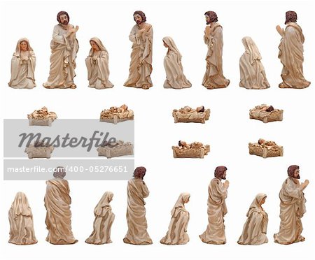 Christmas crib isolated on white statuettes representing Mary, Jesus and Joseph.