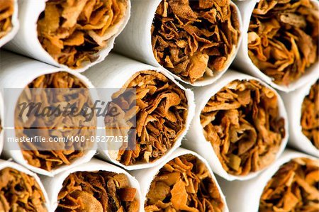 Close up of smoking cigarettes as antismoking concept