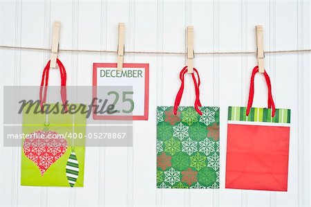 Gift Sack and Christmas Calendar Page on a Clothesline.  Holiday Concept.