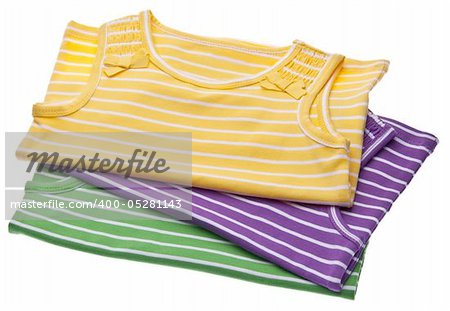 Vibrant childrens striped shirts isolated on white with a clipping path.  Summer Fashion Image.