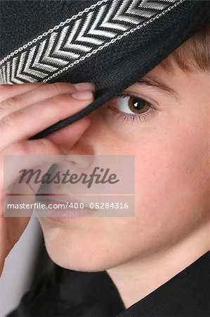 Teenage boy wearing a black hat in casual wear