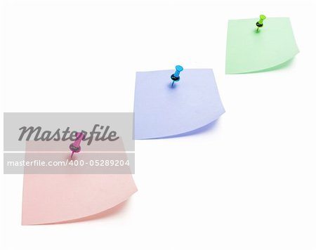 Post It Notes with Pushpins on White Background