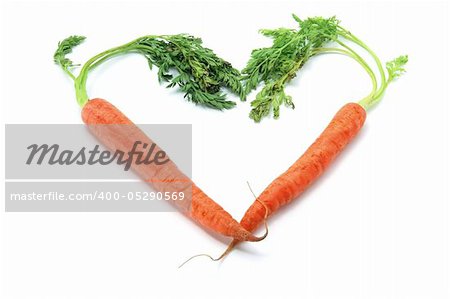 Carrots in Heart Shape on White Background