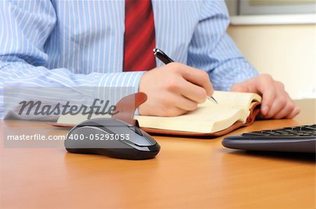 Businessman at office working at his workplace.