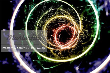 A rainbow colored spiral of bright sparkling light