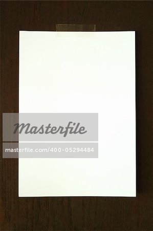 White paper on wood wall