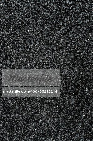 Abstract photo of dark asphalted surface background