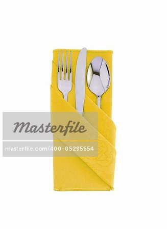 fork ,knife and spoon on yellow cloth isolated on white background