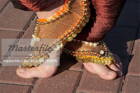 Element of national clothes. Decoration on feet.
