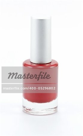 A bottle of red nail polish Isolated on white background