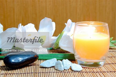 spa and wellness concept with flowers zen stones and towel