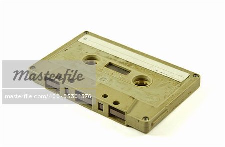 An old audio cassette isolated on a white background