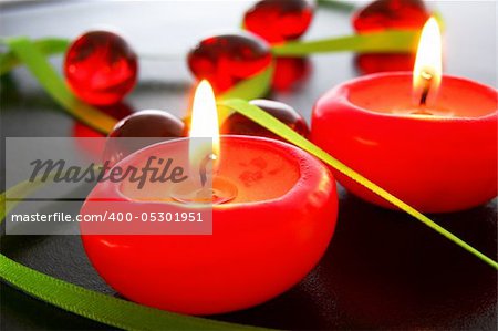 red hot candles showing xmas or spa decoration