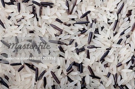 uncooked wild rice mix forming a background pattern