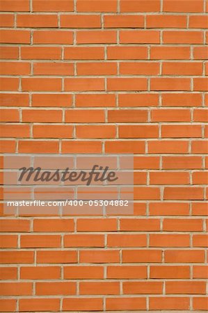 front view of red bricks wall with concrete