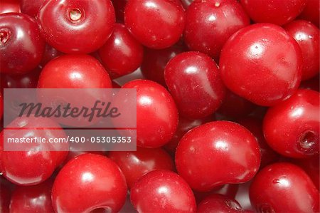 Ripe red cherries closeup photo good as background