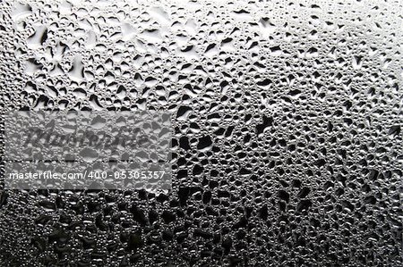 Drops of dew on the window glass