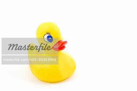 isolated toy rubber duck for playing in the bathroom