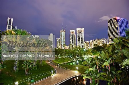 Night scene of modern city with park in Kuala Lumpur, Malaysia, Asia.