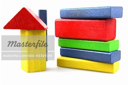 Wooden building blocks on white background