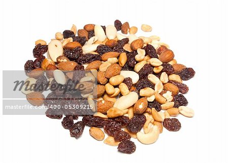 heap of seeds and raisins isolated on white