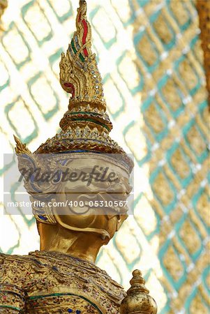 Huge demon standing in front of a buddhist temple, Bangkok, Thailand