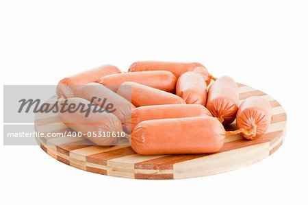 delicious sausages on board isolated on white