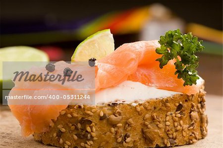 photo of delicious crispy cereals bread with smoked salmon