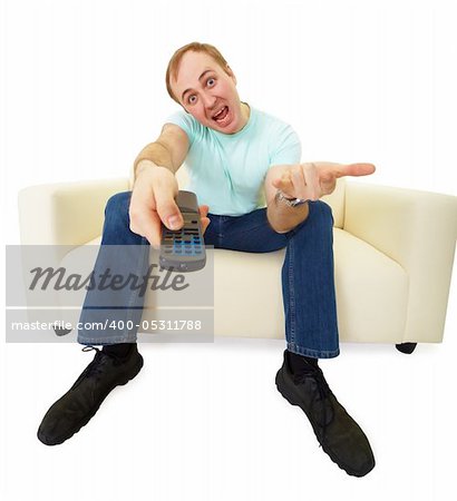 emotional man with a TV remote control sitting on the couch