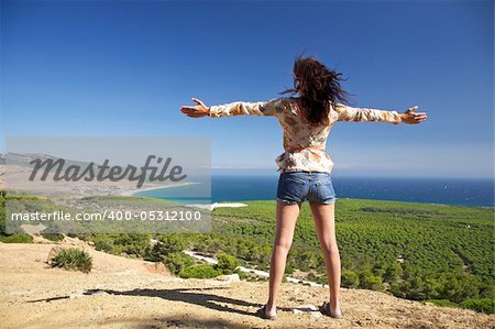 Woman over Bolonia beach at Cadiz Andalusia in Spain