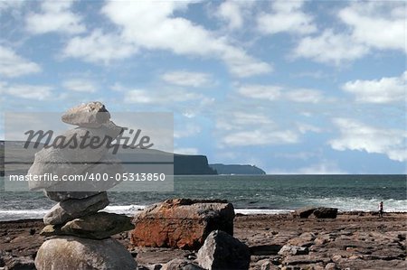 rock piles on the beach in doolin county clare ireland